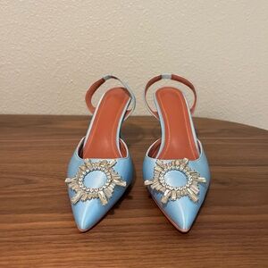 Slingback Pumps (heels) with stunning jewel detail.